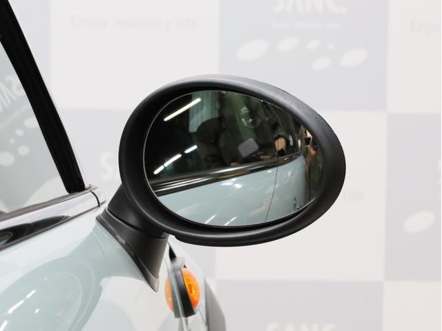 ＭＩＮＩ ワン　禁煙　アイスブルーボディ色　マニュアルモード付き６速ＡＴ　クロームラインエクステリア　革巻きシフトノブ　１５インチＡＷ　フロントフォグランプ　盗難防止装置　純正ＣＤオーディオ　キーレスエントリー（76枚目）
