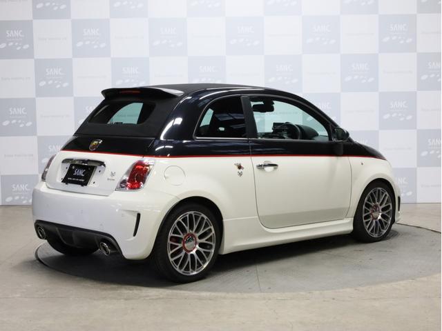 アバルト595C ツーリズモ 禁煙 赤革シート 2トーンボディカラー ブラックソフトトップ 17インチAW ケンウッド製ナビTV リアコーナーセンサー スポーツモード ルーフエンドスポイラー スポーツサス レッドキャリパー(33枚目)