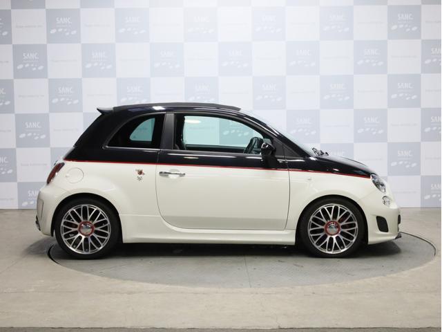 アバルト595C ツーリズモ 禁煙 赤革シート 2トーンボディカラー ブラックソフトトップ 17インチAW ケンウッド製ナビTV リアコーナーセンサー スポーツモード ルーフエンドスポイラー スポーツサス レッドキャリパー(34枚目)