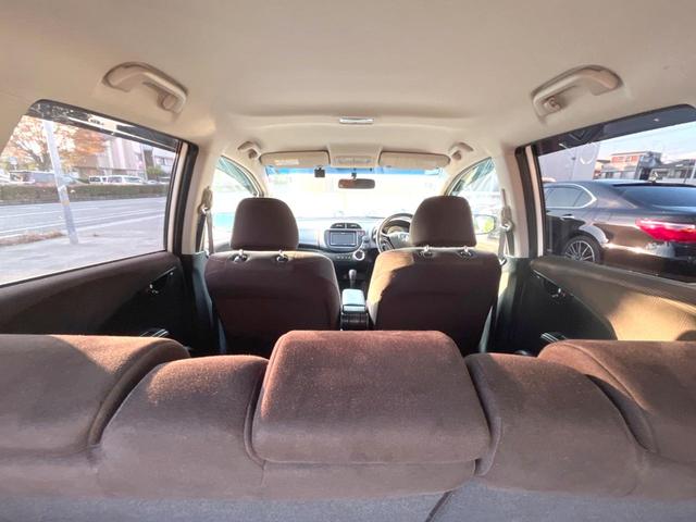 フィットハイブリッド シーズ　ファインスタイル　ｃａｒｒｏｚｚｅｒｉａ製ナビ　バックカメラ　ドライブレコーダー　クルーズコントロール　シートヒーター　ＨＩＤヘッドライト　Ｂｌｕｅｔｏｏｔｈ接続　ＥＴＣ　スマートキー（50枚目）