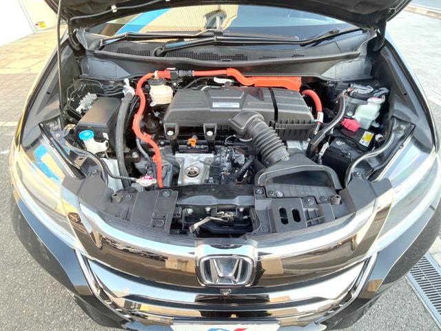 オデッセイハイブリッド ハイブリッドアブソルート・ホンダセンシング 純正8インチナビ 全方位カメラ フリップダウンモニター アダプティブクルーズコントロール 両側パワースライドドア 7人乗り LEDヘッドライト 純正17インチアルミホイール Bluetooth接続(18枚目)