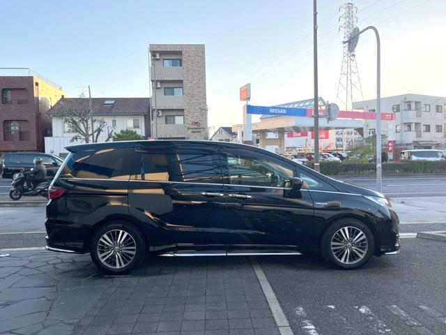 オデッセイハイブリッド ハイブリッドアブソルート・ホンダセンシング 純正8インチナビ 全方位カメラ フリップダウンモニター アダプティブクルーズコントロール 両側パワースライドドア 7人乗り LEDヘッドライト 純正17インチアルミホイール Bluetooth接続(57枚目)