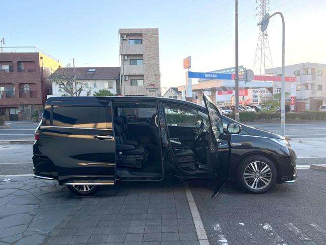 オデッセイハイブリッド ハイブリッドアブソルート・ホンダセンシング 純正8インチナビ 全方位カメラ フリップダウンモニター アダプティブクルーズコントロール 両側パワースライドドア 7人乗り LEDヘッドライト 純正17インチアルミホイール Bluetooth接続(58枚目)