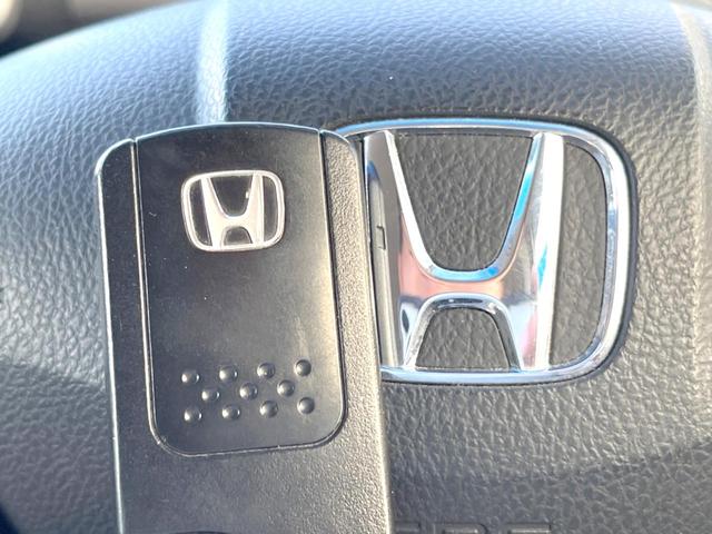 フリード Ｇ　ジャストセレクション＋　純正ナビ　バックカメラ　パワースライドドア　７人乗り　ＨＩＤヘッドライト　スマートキー　ＥＴＣ　オートエアコン　Ｂｌｕｅｔｏｏｔｈ接続（45枚目）