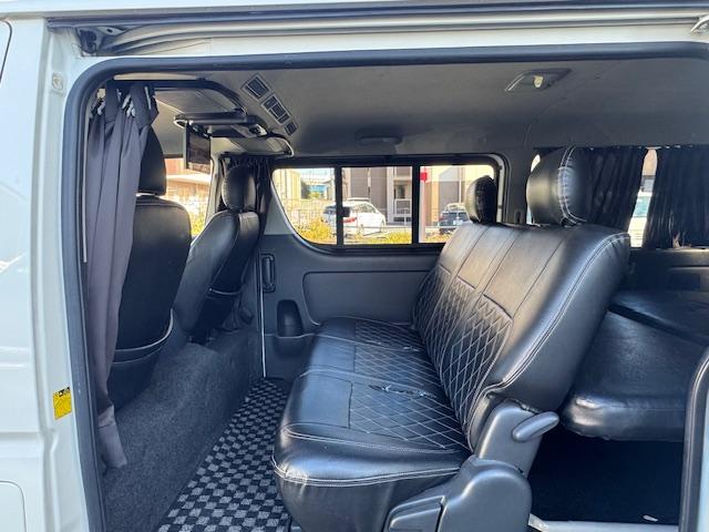 ハイエースバン ロングスーパーGL HIDライト LEDフォグ 社外テール ローダウン15インチAW ALPINEナビ地デジフルセグTV ALPINE天井モニター バックカメラETC ベッドキット シートカバー 黒木目オーディオパネル(70枚目)