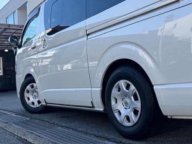 ハイエースバン ロングスーパーＧＬ　寒冷地仕様　ディーゼルターボ　ＬＥＤヘッドライトＬＥＤフォグ　ローダウン　ナビ地デジＴＶバックカメラＥＴＣ　新品シートカバー　スマートキー　リアエアコンリアヒーター両側スライドドア　小窓ガラス（12枚目）