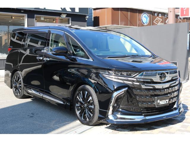 アルファードハイブリッド エグゼクティブラウンジ ワンオーナー 禁煙車 純正ナビ フルセグTV モデリスタフルエアロ トヨタチームメイト パノラミックビューモニター ユニバーサルステップ ベージュ革シート JBLサウンド フリップダウンモニター(7枚目)