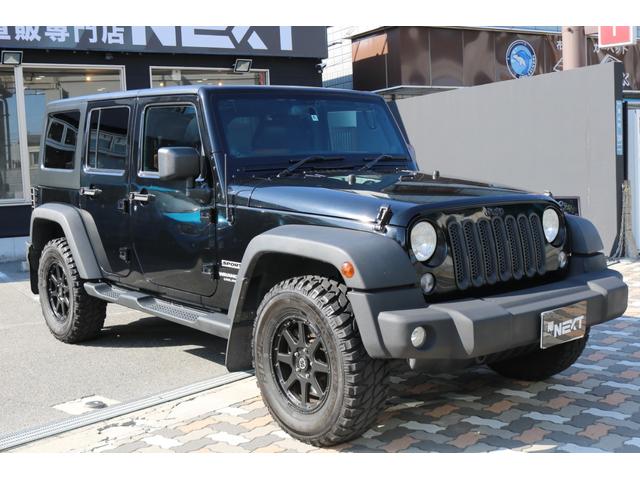 ジープ・ラングラーアンリミテッド スポーツ　ワンオーナー　禁煙車　社外ナビ　フルセグＴＶ　バックカメラ　クルーズコントロール　レザー調シートカバー（5枚目）