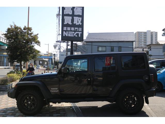 ジープ・ラングラーアンリミテッド スポーツ　ワンオーナー　禁煙車　社外ナビ　フルセグＴＶ　バックカメラ　クルーズコントロール　レザー調シートカバー（8枚目）