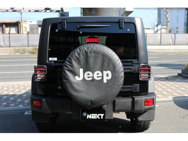 ジープ・ラングラーアンリミテッド スポーツ　ワンオーナー　禁煙車　社外ナビ　フルセグＴＶ　バックカメラ　クルーズコントロール　レザー調シートカバー（10枚目）