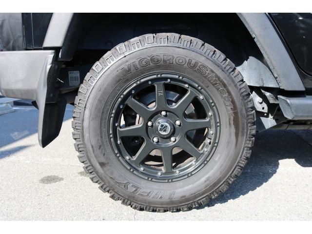 ジープ・ラングラーアンリミテッド スポーツ　ワンオーナー　禁煙車　社外ナビ　フルセグＴＶ　バックカメラ　クルーズコントロール　レザー調シートカバー（30枚目）