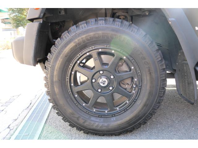 ジープ・ラングラーアンリミテッド スポーツ　ワンオーナー　禁煙車　社外ナビ　フルセグＴＶ　バックカメラ　クルーズコントロール　レザー調シートカバー（32枚目）