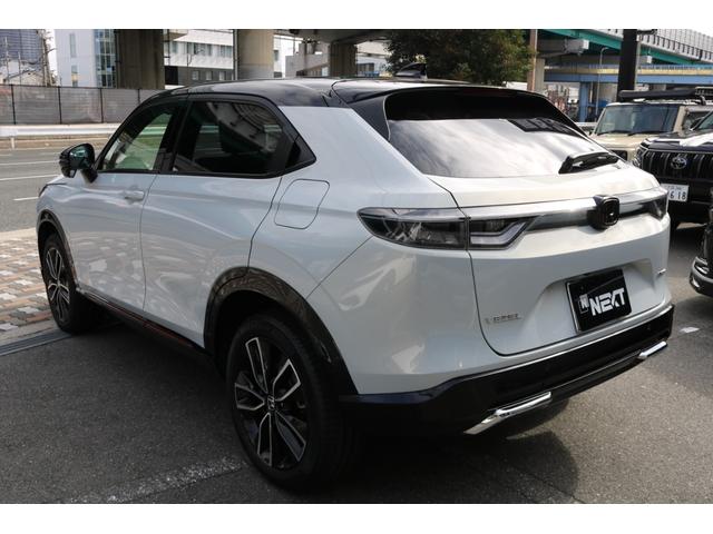 ヴェゼル e:HEV PLaY 禁煙車 ホンダセンシング 純正ナビ パノラミックビューモニター パノラマルーフ ハーフレザーシート ツートンルーフ パワーバックドア BSM クリアランスソナー ハーフレザーシート シートヒーター(9枚目)