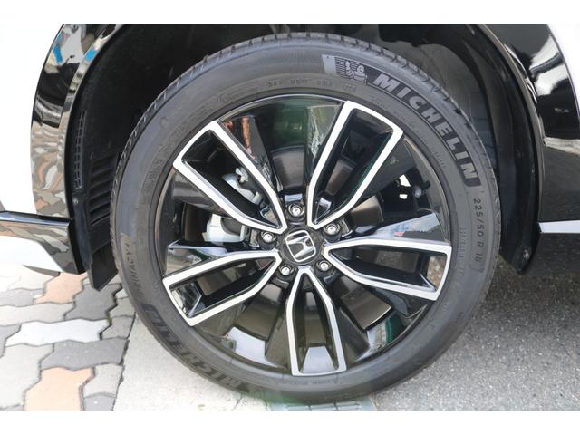 ヴェゼル e:HEV PLaY 禁煙車 ホンダセンシング 純正ナビ パノラミックビューモニター パノラマルーフ ハーフレザーシート ツートンルーフ パワーバックドア BSM クリアランスソナー ハーフレザーシート シートヒーター(34枚目)