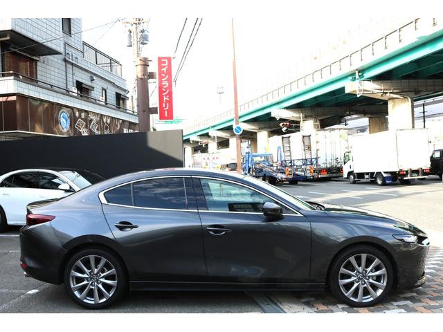 ＭＡＺＤＡ３セダン １５Ｓ　ツーリング　ワンオーナー　禁煙車　純正ナビ　フルセグＴＶ　ヘッドアップディスプレイ　ＬＥＤヘッド　クルコン　Ｂカメラ　ＢＳＭ　アイストップ　パーキングサポート　スマートブレーキサポート　　パワーバックドア（6枚目）