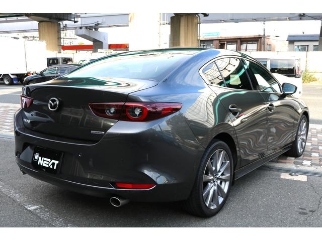 ＭＡＺＤＡ３セダン １５Ｓ　ツーリング　ワンオーナー　禁煙車　純正ナビ　フルセグＴＶ　ヘッドアップディスプレイ　ＬＥＤヘッド　クルコン　Ｂカメラ　ＢＳＭ　アイストップ　パーキングサポート　スマートブレーキサポート　　パワーバックドア（7枚目）