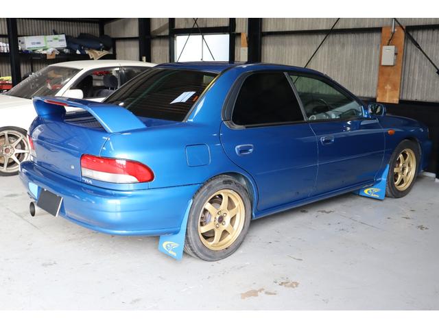 インプレッサ ＷＲＸタイプＲＡ　リミテッド　５ＭＴ　１０００台限定車　シリアル番号２９１号車　サンヨーテクニカターボタイマー　ＥＴＣ　ＬＥＤヘッドライト　純正１６インチ　大型リアスポイラー　柿本改マフラー（5枚目）