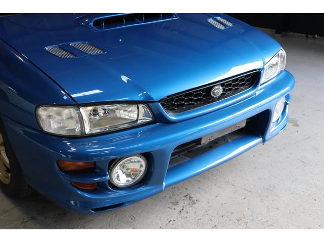 インプレッサ ＷＲＸタイプＲＡ　リミテッド　５ＭＴ　１０００台限定車　シリアル番号２９１号車　サンヨーテクニカターボタイマー　ＥＴＣ　ＬＥＤヘッドライト　純正１６インチ　大型リアスポイラー　柿本改マフラー（8枚目）