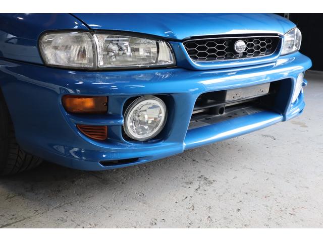 インプレッサ ＷＲＸタイプＲＡ　リミテッド　５ＭＴ　１０００台限定車　シリアル番号２９１号車　サンヨーテクニカターボタイマー　ＥＴＣ　ＬＥＤヘッドライト　純正１６インチ　大型リアスポイラー　柿本改マフラー（10枚目）