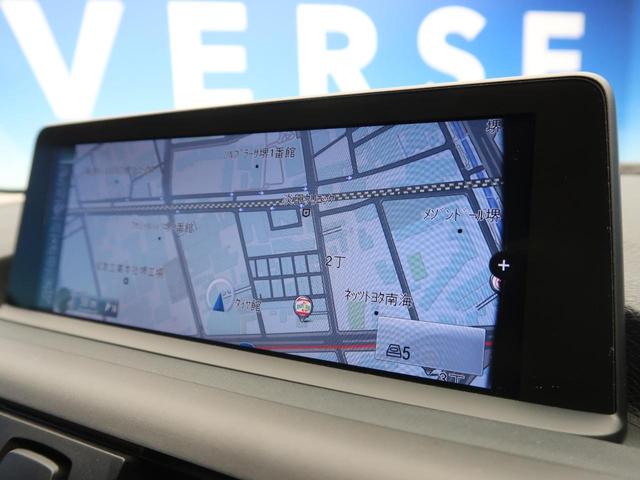 116i スポーツ 純正HDDナビ バックカメラ ETC TVチューナー HIDヘッドライト オートライト 純正16インチAW 前席スポーツシート(レッドステッチ入り) デュアルオートAC リアパークソナー(6枚目)