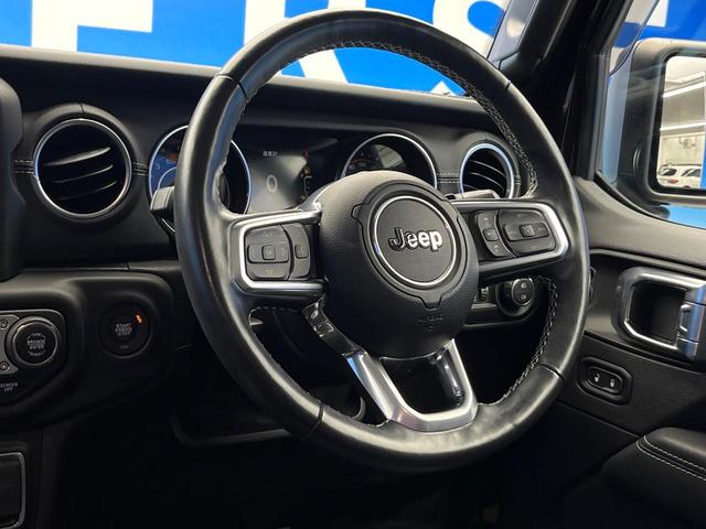 ジープ・ラングラーアンリミテッド サハラ ワンオーナー レーダークルーズコントロール 黒革シート 前席シートヒーター ダウンヒルアシスト デュアルオートエアコン バックカメラ 衝突軽減システム コーナーセンサー オートライト フルセグ 禁煙車(11枚目)