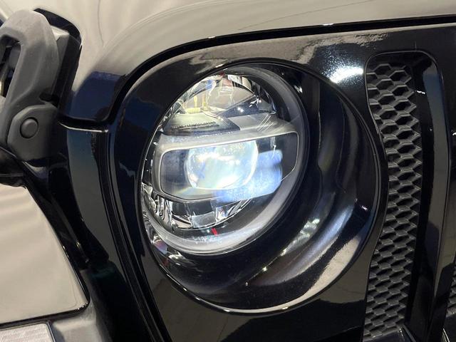 ジープ・ラングラーアンリミテッド サハラ ワンオーナー レーダークルーズコントロール 黒革シート 前席シートヒーター ダウンヒルアシスト デュアルオートエアコン バックカメラ 衝突軽減システム コーナーセンサー オートライト フルセグ 禁煙車(43枚目)