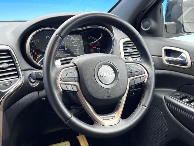 ジープ・グランドチェロキー ラレード クルーズコントロール 前席パワーシート HIDヘッドランプ 純正18インチアルミ バックカメラ オートライト 4WD ダウンヒルアシスト Bluetooth再生 禁煙車(11枚目)