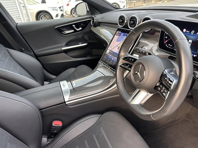 Cクラスステーションワゴン C220dステーションワゴンアバンギルドAMGライP ベーシックパッケージ パノラミックスライディングルーフ ヘッドアップディスプレイ 全周囲カメラ アンビエントライト64色 LEDヘッドライト メモリー付パワーシート 電動テールゲート ワンオーナー(18枚目)