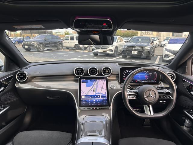 Cクラスステーションワゴン C220dステーションワゴンアバンギルドAMGライP ベーシックパッケージ パノラミックスライディングルーフ ヘッドアップディスプレイ 全周囲カメラ アンビエントライト64色 LEDヘッドライト メモリー付パワーシート 電動テールゲート ワンオーナー(28枚目)