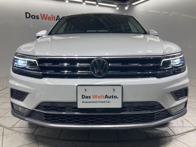 ティグアン ディナウディオエディション 特別仕様車 レザーシート シートヒーター パドルシフト 電動パーキングブレーキ アラウンドビューカメラ 純正ナビ 19インチアルミ レーンアシスト パワーシート 電動リアゲート シルバールーフレール(24枚目)