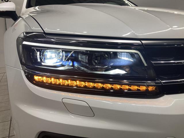 ティグアン ディナウディオエディション 特別仕様車 レザーシート シートヒーター パドルシフト 電動パーキングブレーキ アラウンドビューカメラ 純正ナビ 19インチアルミ レーンアシスト パワーシート 電動リアゲート シルバールーフレール(26枚目)