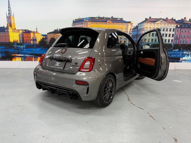 アバルト595 コンペティツィオーネ 茶革 黄色ブレンボキャリパー カーボンミラー ETC ドラレコ 5MT JBLスピーカー カーボンバンパー 純正ディスプレイオーディオ グリージョレコード(4枚目)