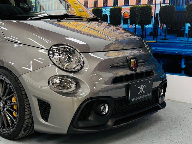 アバルト595 コンペティツィオーネ 茶革 黄色ブレンボキャリパー カーボンミラー ETC ドラレコ 5MT JBLスピーカー カーボンバンパー 純正ディスプレイオーディオ グリージョレコード(7枚目)