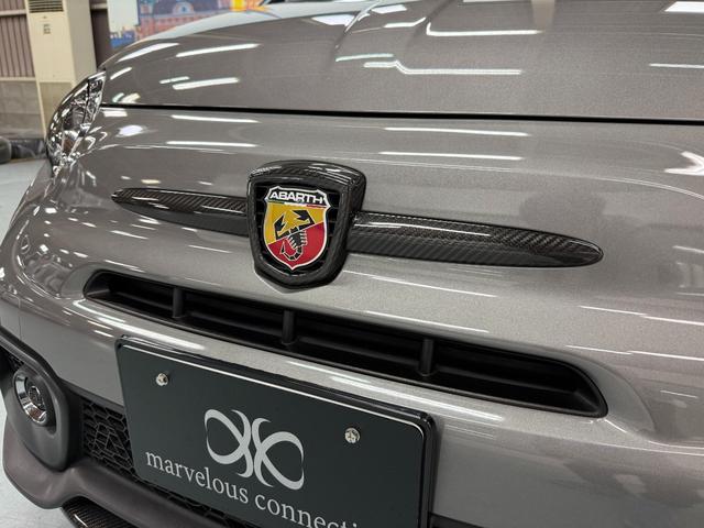 アバルト595 コンペティツィオーネ 茶革 黄色ブレンボキャリパー カーボンミラー ETC ドラレコ 5MT JBLスピーカー カーボンバンパー 純正ディスプレイオーディオ グリージョレコード(10枚目)