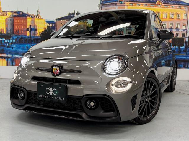 アバルト595 コンペティツィオーネ 茶革 黄色ブレンボキャリパー カーボンミラー ETC ドラレコ 5MT JBLスピーカー カーボンバンパー 純正ディスプレイオーディオ グリージョレコード(12枚目)