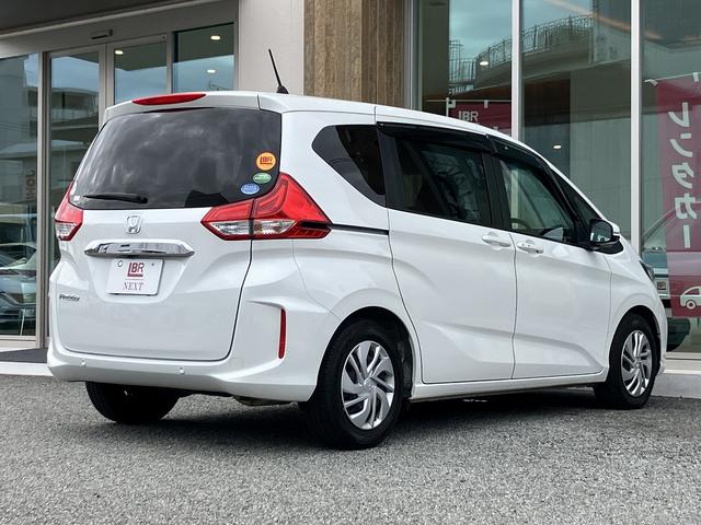 フリード Ｇ・ホンダセンシング　両側パワースライドドア・社外ナビ・バックカメラ・ＬＥＤヘッドライト・ＡＣＣ／ＬＫＡ・衝突軽減装置・スマートキー・後席サンシェード・ＣＤ／ＦＭ／ＡＭ／Ｂｌｕｅｔｏｏｔｈオーディオ・禁煙（32枚目）