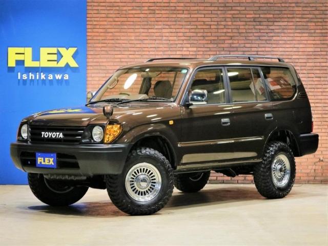 TX 後期型 ガソリン 茶内装 ルーフレール 丸目ヘッドライト オレンジコーナーレンズ TOYOTAグリル LEDテールレンズ DEANカリフォルニア16インチAW グットリッチATタイヤ(1枚目)