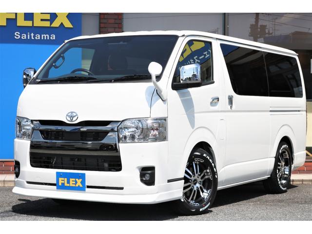 スーパーGL ダークプライムII ガソリン2WD11インチPKG1.5インチローダウンガッツミラー同色FLEXリップスポイラーDELF0217インチAWナスカーレタータイヤアルティメットテールHDMIUSBビルトインETC2.0(1枚目)