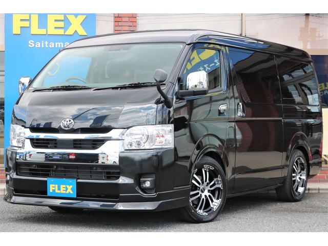 GL ロング アレンジAS内装架装フルフラット対面座席アルパイン11インチナビ後席フリップダウンモニターHDMI/USBソケットETC2.0リップスポイラーオーバーフェンダー18インチAWヨコハマパラダタイヤ(1枚目)