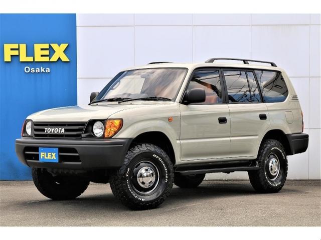 トヨタ ランドクルーザープラド ＴＸ　ＴＯＹＯＴＡ文字ＦｒグリルオレンジコーナーランプＬＥＤテールランプジムライン製　ポリッシュ　１６ｉｎｃｈＡＷ　ブリジストン　ＡＴタイヤ　ｃａｒｒｏｚｚｅｒｉａ製フルセグナビ　前後ドライブレコーダー