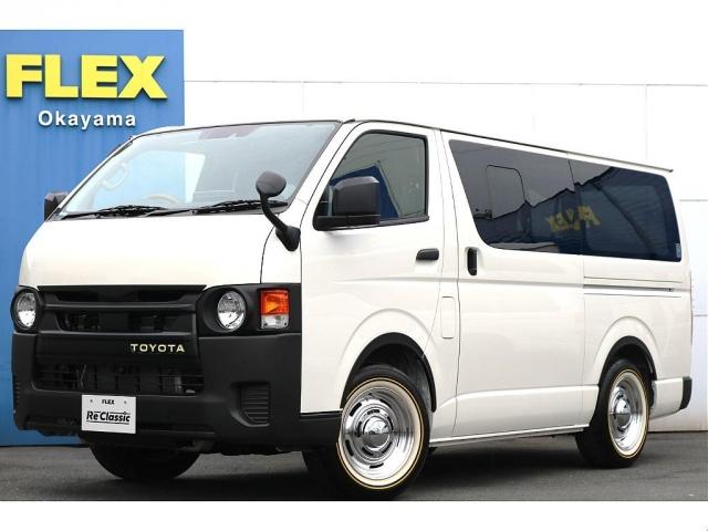 ハイエースバン ロングＤＸ　新車　ＤＸ　ガソリン２ＷＤ　４ナンバー　ウッドリム　ＲｅＣｌａｓｓｉｃ丸目一式　ブラックエディション　オーバーフェンダー　ＬＥＤテールランプ　ＢＩＧＸ１１インチＳＤナビ　ＥＴＣ　フォグランプ（1枚目）