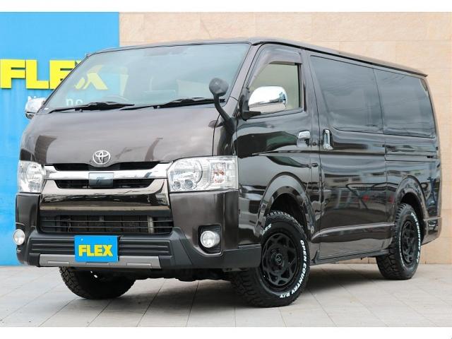 ハイエースバン ロングスーパーＧＬ　ＢＩＧ－Ｘ１１インチナビＥＴＣ　ＴフォーススポイラーＮＴ－１　１６インチアルミオープンカントリーＲＴタイヤアルティメットＩＩＬＥＤテールＬＥＤハイマウントリアミラーホールカバー１００Ｖ寒冷地仕様（1枚目）