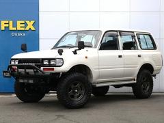ランドクルーザー80 GX 純正ホワイトボディー リヤ観音開き 電動フェンダーミラー デフロック約3インチリフトアップ IPF製LEDバー 新品角目4灯レンズ 新品TOYOオープンカントリーMTタイヤ バックカメラETCキーレス 中古車画像
