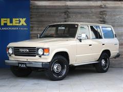 ランドクルーザー60 GX ディーゼル 走行18万km台 オートマミッション 丸目フェイス ロールーフ換装 輸出用15inchスチールホイール&BFグッドリッチKO2 NARDIクラシックウッドステアリング 純正車高 純正バンパ 中古車画像