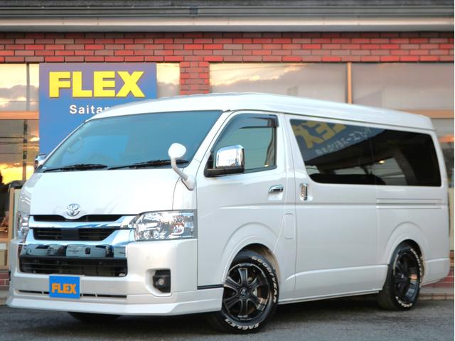 ハイエースワゴン(トヨタ) ＧＬ　ロング　【買取直販】ＦＬＥＸカスタム　ＢＩＧ−Ｘ１１インチナビ　フリップダウンモニター　ミラーリング対応ＨＤＭＩポート　艶消しマホガニーパネル　スマートベット　トヨタセーフティセンス　デジタルインナーミラー 中古車画像