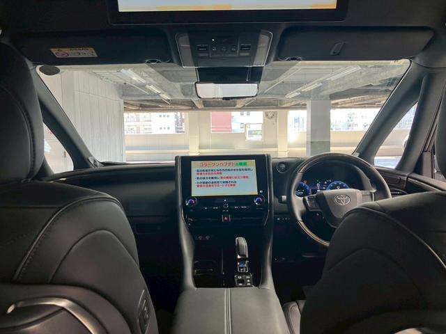 アルファードハイブリッド エグゼクティブラウンジ ユニバーサルステップ ブラックレザー 内蔵型ドラレコ TVキャンセラー 後席タブレット2個 フリップダウンモニター ムーンルーフ JBL 純正19AW 温冷シートデジタルミラー HUD ワイヤレス充電(3枚目)
