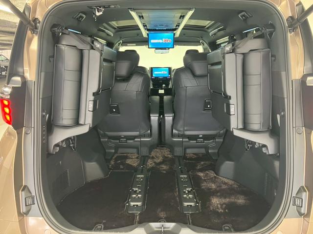 アルファードハイブリッド エグゼクティブラウンジ ユニバーサルステップ ブラックレザー 内蔵型ドラレコ TVキャンセラー 後席タブレット2個 フリップダウンモニター ムーンルーフ JBL 純正19AW 温冷シートデジタルミラー HUD ワイヤレス充電(71枚目)