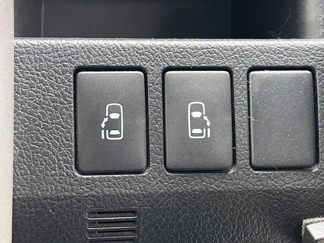 Si フリップダウンモニター 両側電動スライドドア 禁煙車 純正ナビ バックカメラ ETC HIDヘッド スマートキー 革巻きステアリング 純正16インチアルミ フロントフォグ オートライト オートエアコン(4枚目)