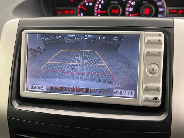 Si フリップダウンモニター 両側電動スライドドア 禁煙車 純正ナビ バックカメラ ETC HIDヘッド スマートキー 革巻きステアリング 純正16インチアルミ フロントフォグ オートライト オートエアコン(6枚目)