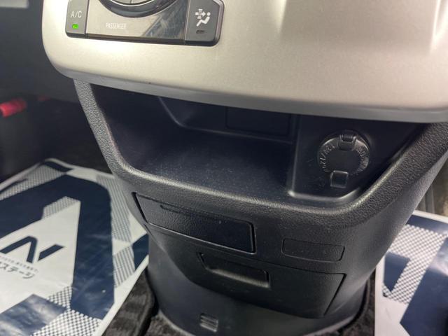 Si フリップダウンモニター 両側電動スライドドア 禁煙車 純正ナビ バックカメラ ETC HIDヘッド スマートキー 革巻きステアリング 純正16インチアルミ フロントフォグ オートライト オートエアコン(34枚目)